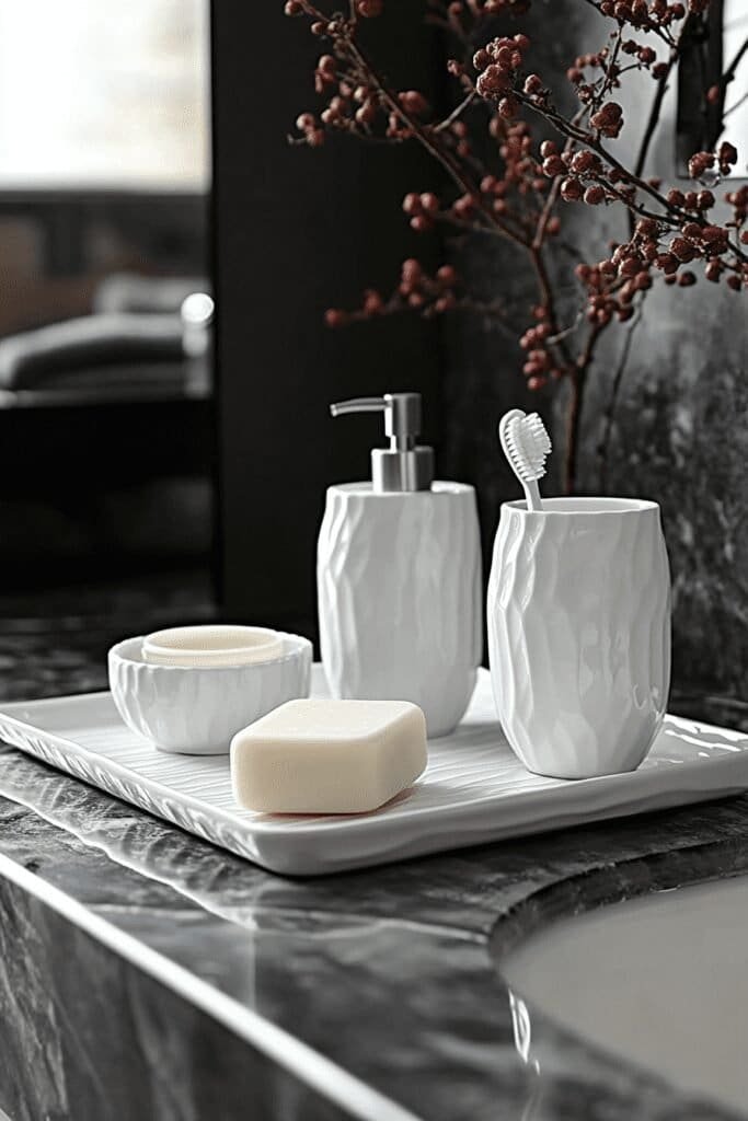 White ceramic bathroom accessories set with soap dispenser, toothbrush holder, and tray